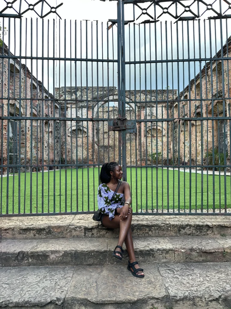 Solo traveler sitting confidently in a safe city environment